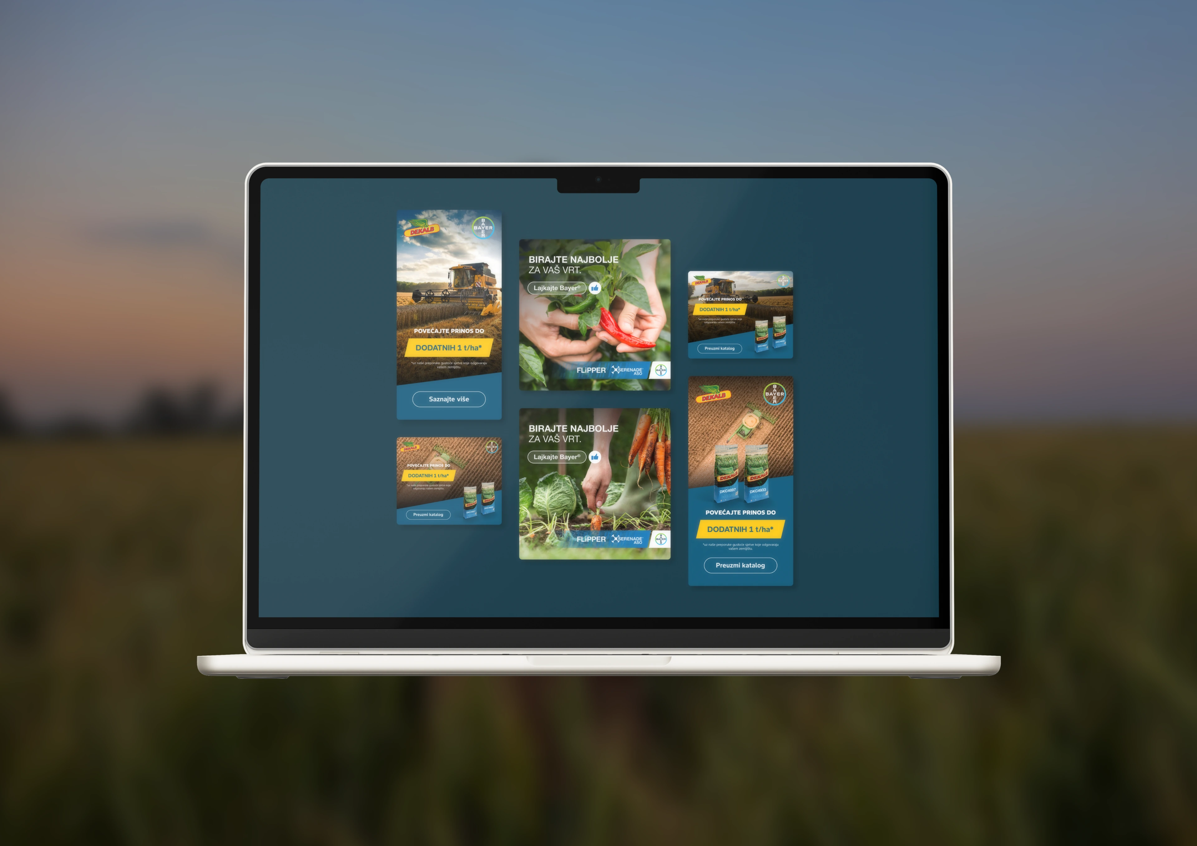 Bayer agricultural digital ad designs displayed on a laptop