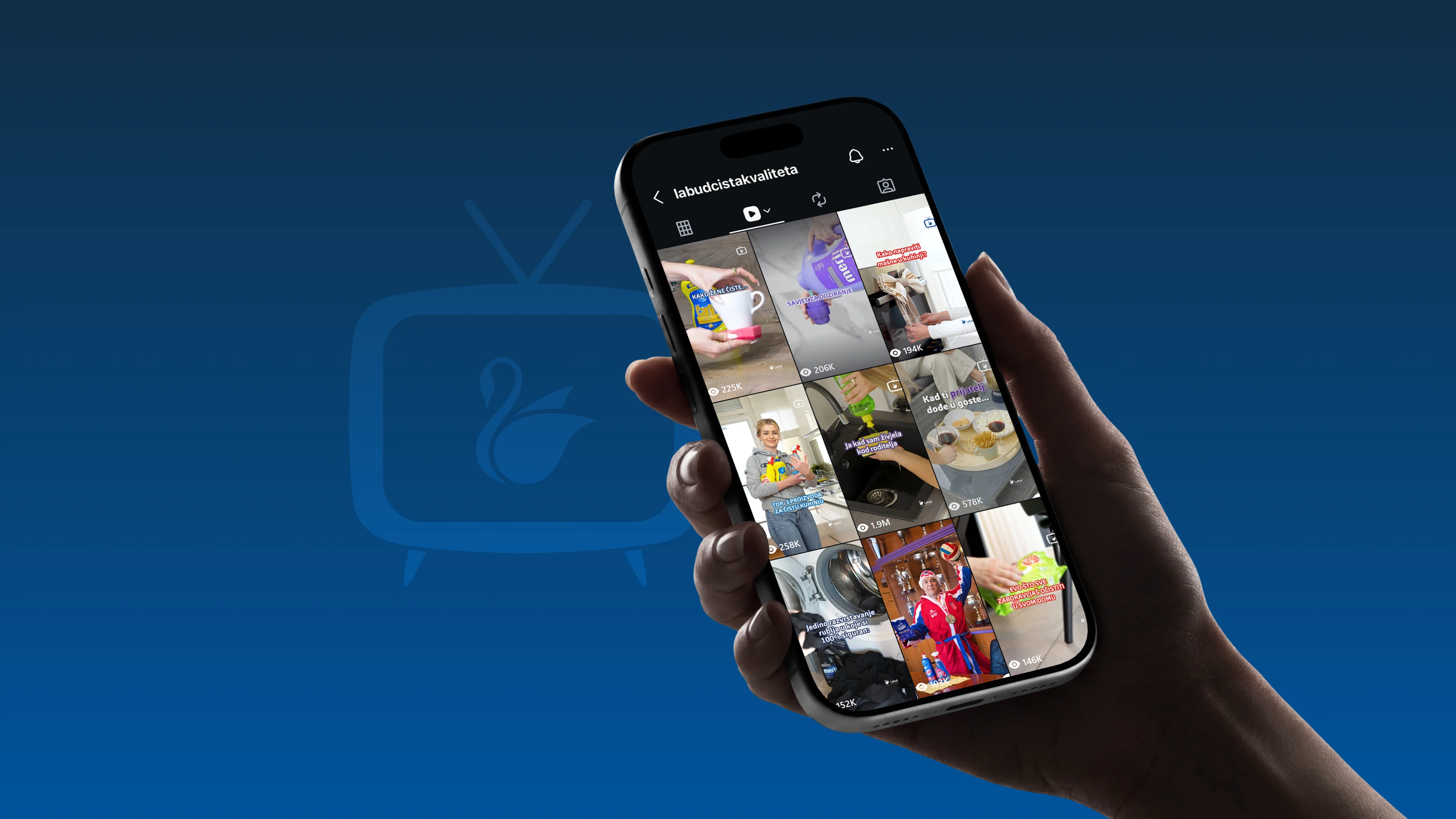 Hand holding a phone displaying a grid of Labud social videos against a blue background.